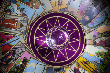 tarot cards in a circle with an orb in the center